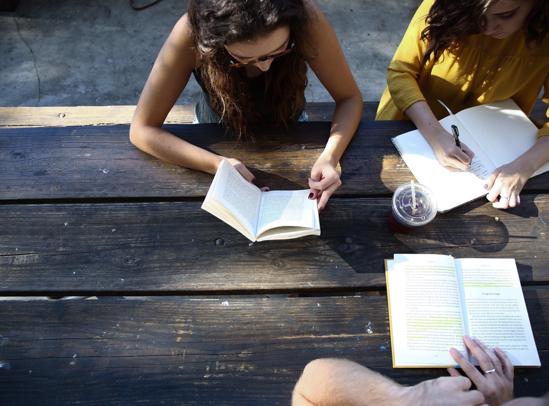 Group studying together on picnic table